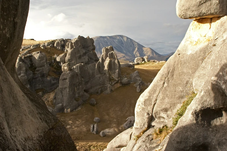 a rocky mountain landscape with rocks and mountains