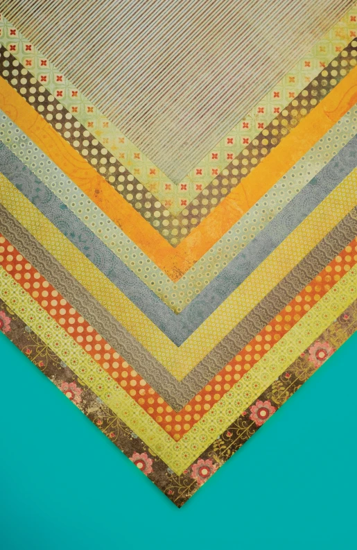 a close up of a triangle shaped rug