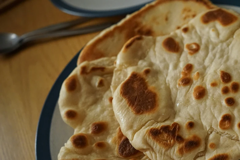 several flat breads laid on top of each other