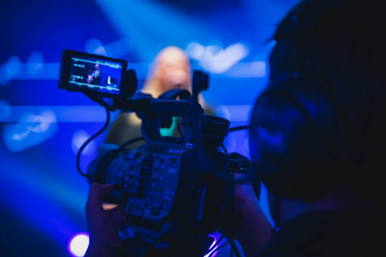 a video camera recording a television show
