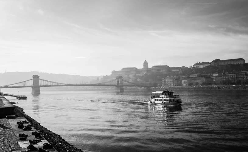 a black and white po of the side of a large bridge