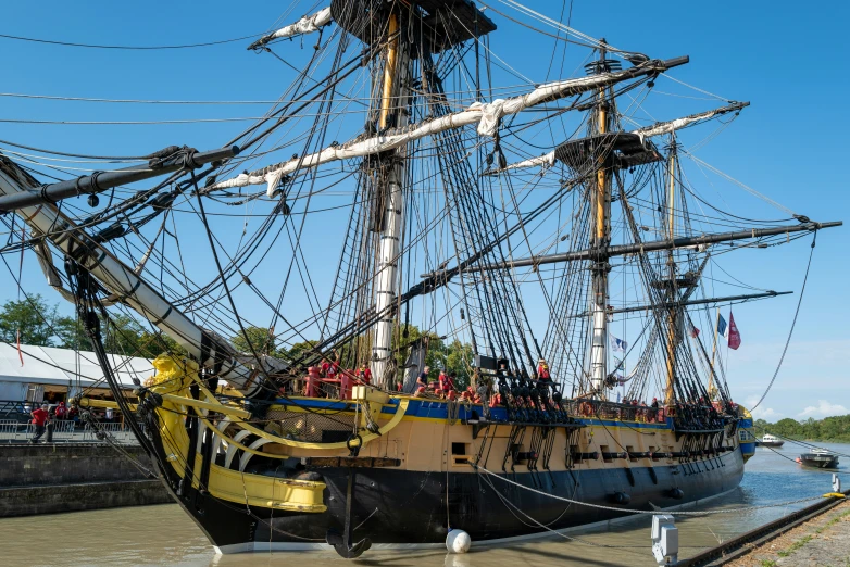 a large boat docked in a body of water