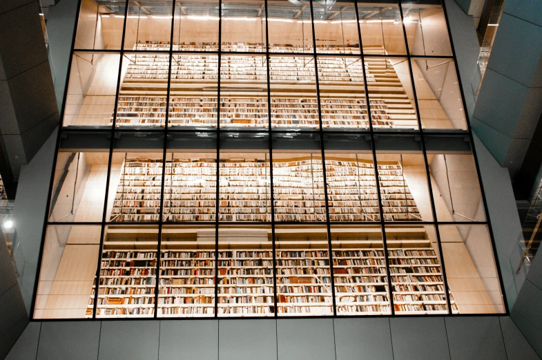 the inside of a building with a lot of books on shelves