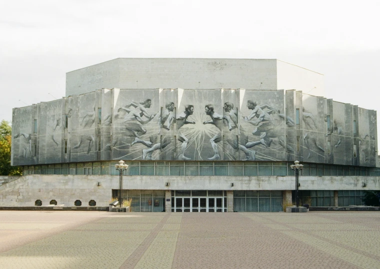 the large building has many paintings on it