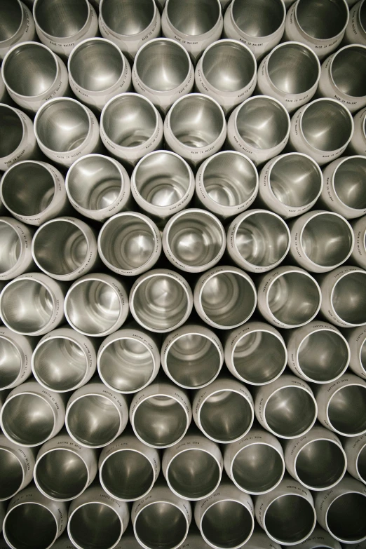 closeup of some silver cups stacked on top of each other