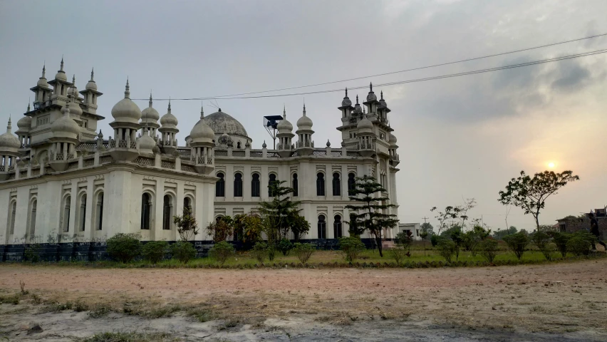 a very big and beautiful building near the water