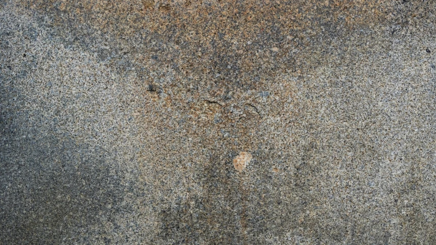 gray cement texture background with small circles on the edges