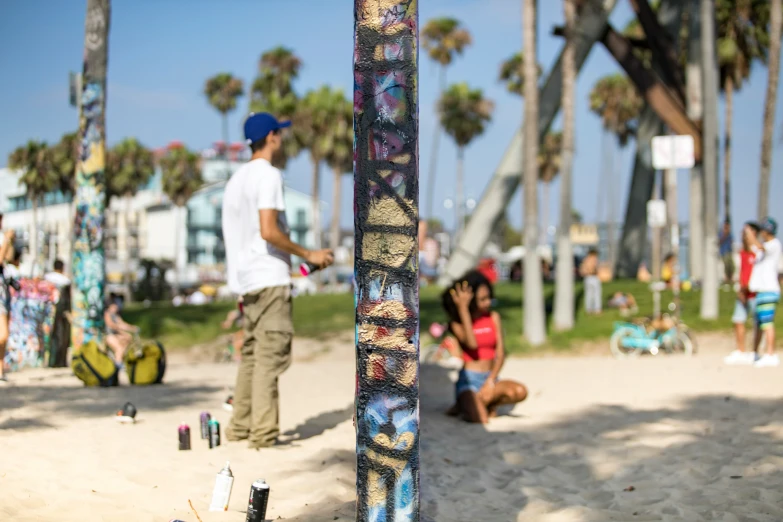 there are many people at the beach with various surfboards