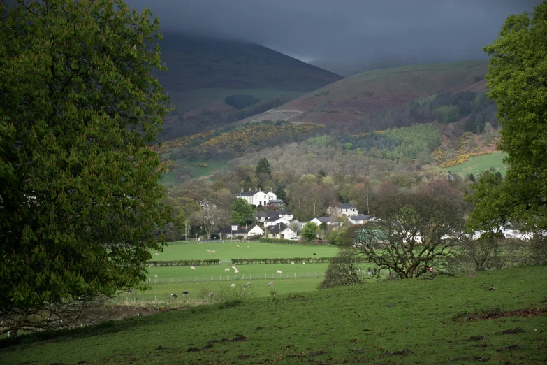 the sky above the hill covered in rain