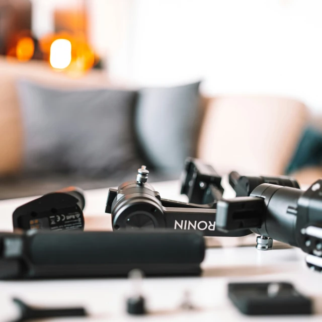 a group of camera equipment sitting on top of a table