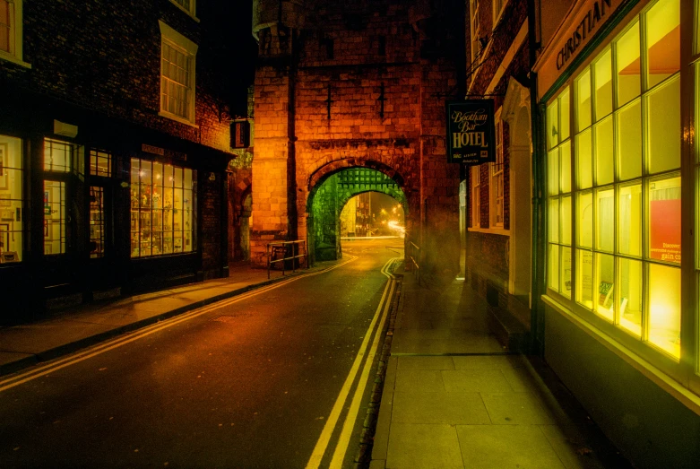 night time image of a building and street in an old city