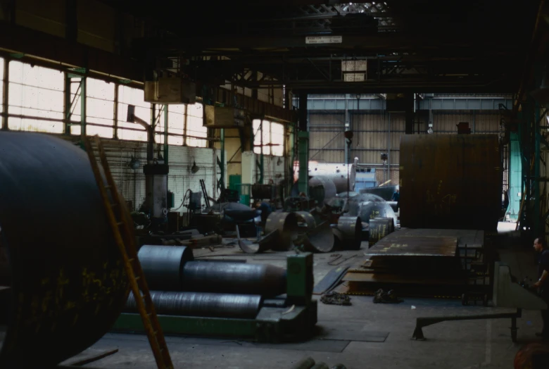 an industrial building is full of metal machines