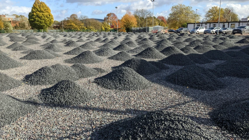 sand on a parking lot that looks like mounds