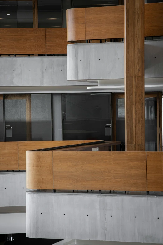 an office building with many wooden counters and cupboards