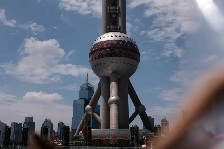 a large tower with some kind of thing growing out of it