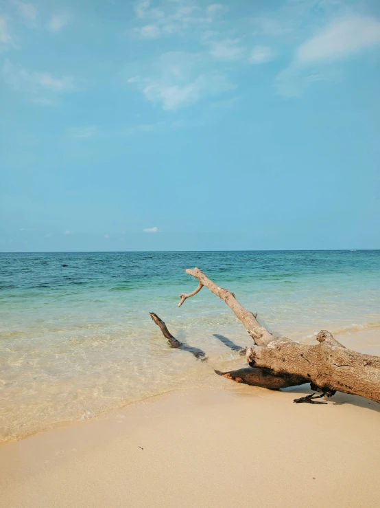 a view of some water, sand and a nch