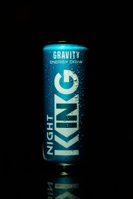 a blue can that is lit up in the dark