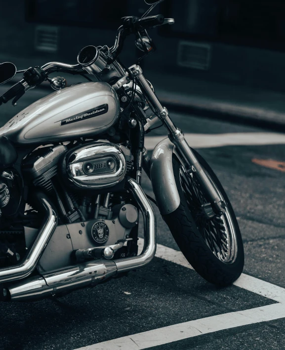 motorcycle parked in front of building with parking meter