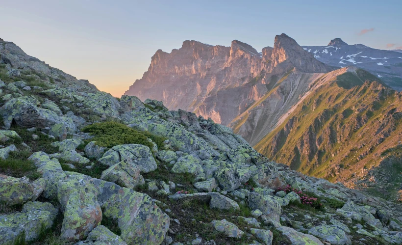 a rocky mountain that is filled with lots of rocks