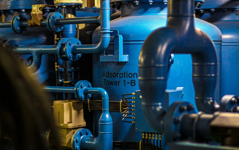 pipes and valves are in an industrial setting