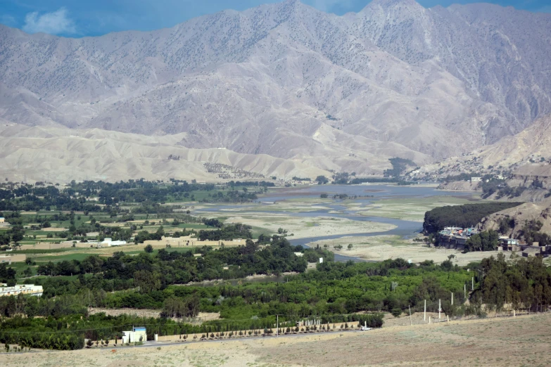 a mountain range and the mountains beyond it