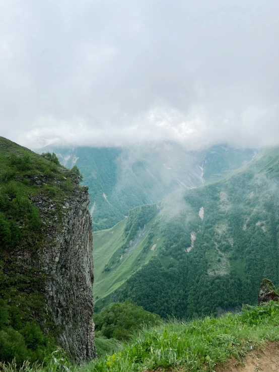 the road is on the mountains with no cars or people