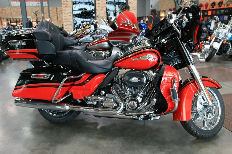 a motorcycle on display in a building with other motorcycles