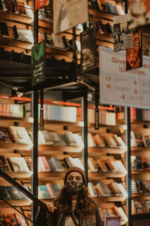 there is a woman that has a mask on in a store