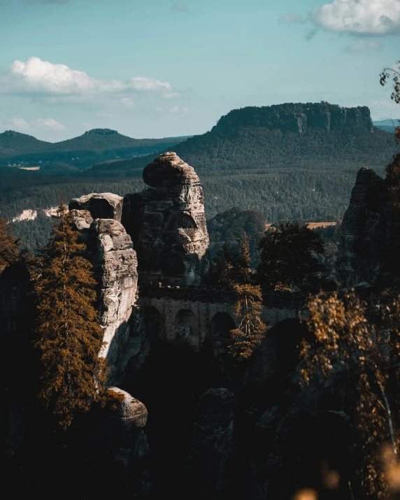 view of mountains from a top of a rock formation