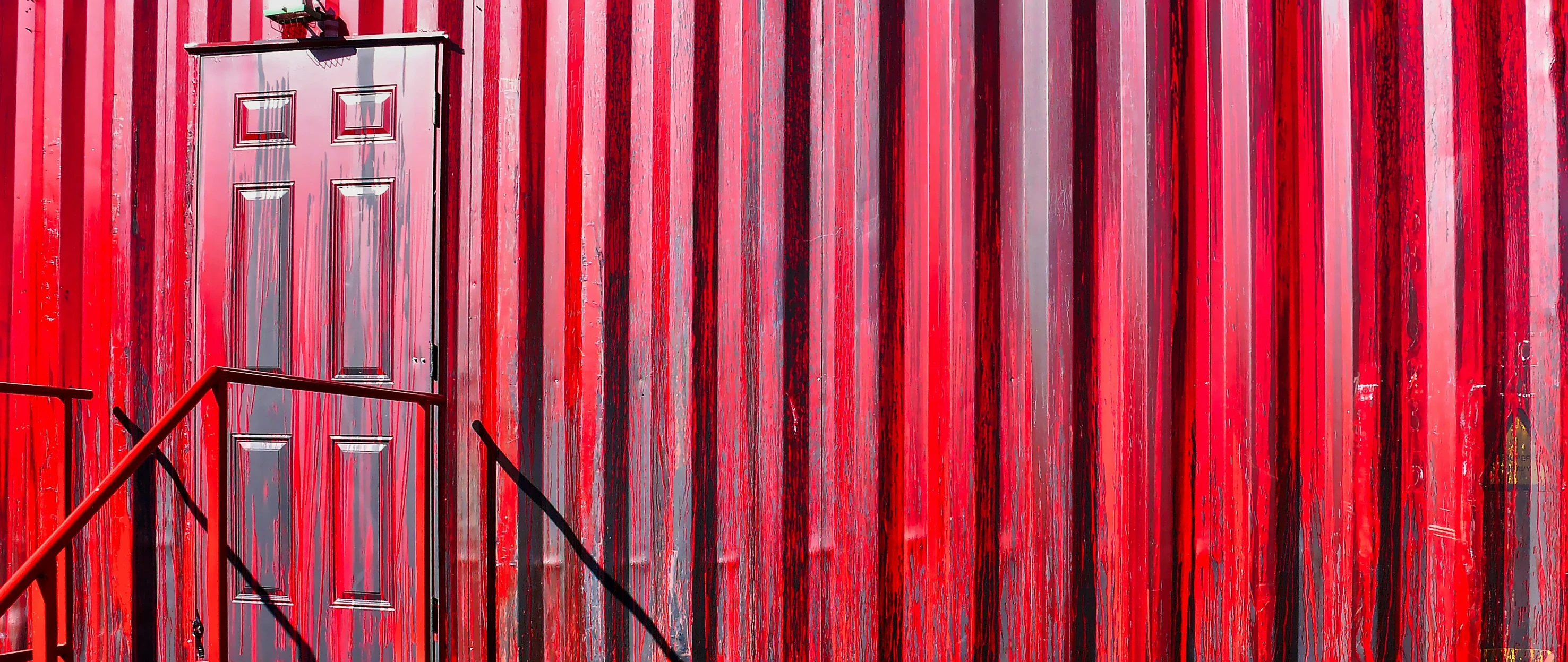 a building that has a metal divider in front