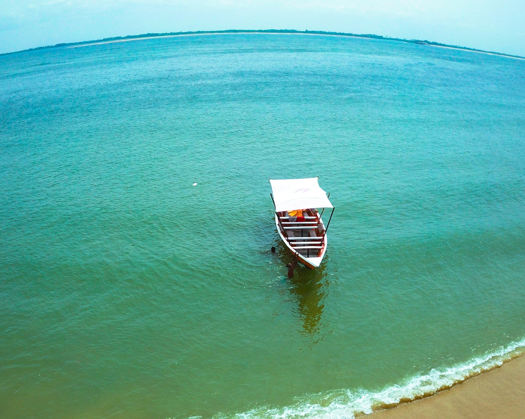 an image of a boat out in the ocean