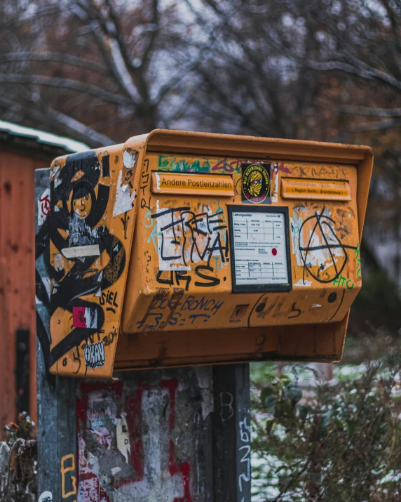 graffiti is added to the side of a mail box