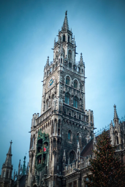 the clock tower is on top of a church