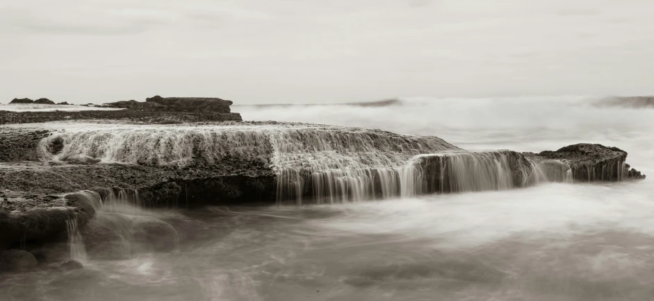 an open air area with waterfall coming out