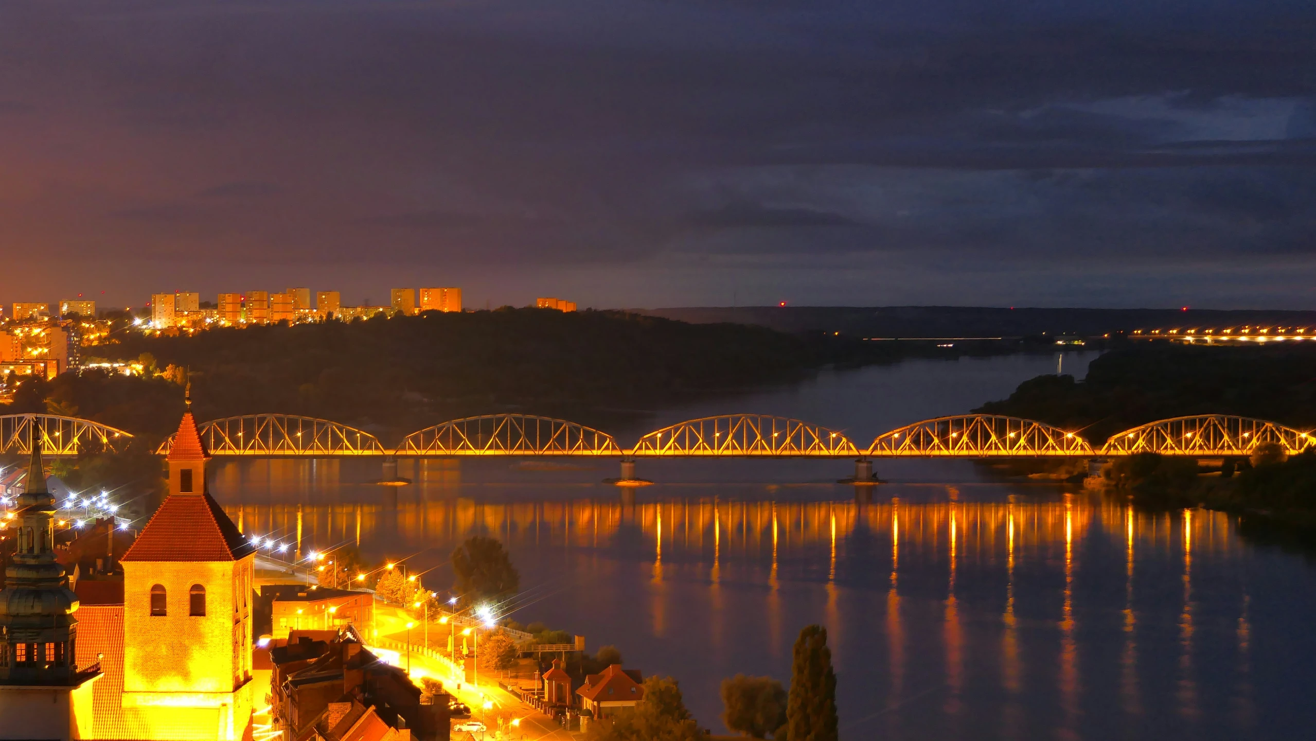 night view over the city lights and the bridge