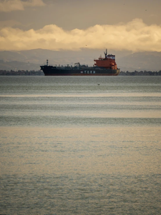 a large boat is out in the ocean