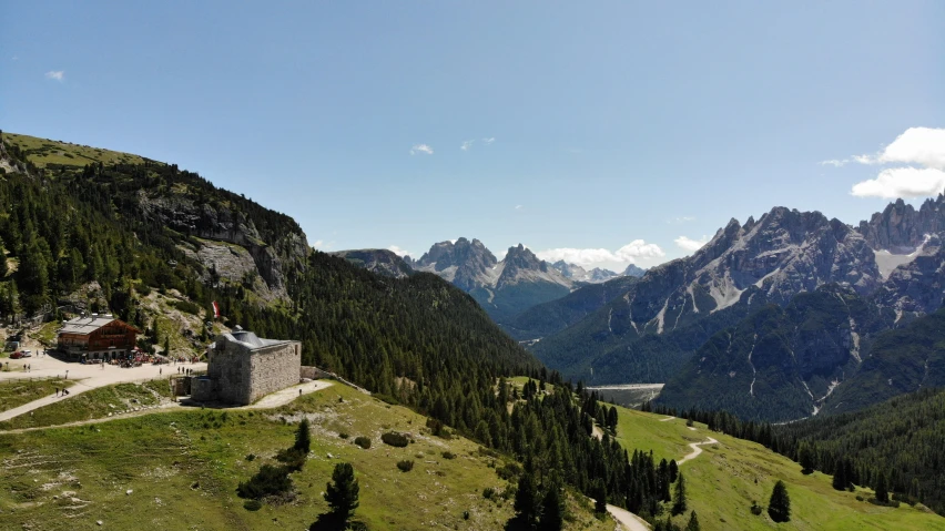 an overlook point with a hill side covered in trees