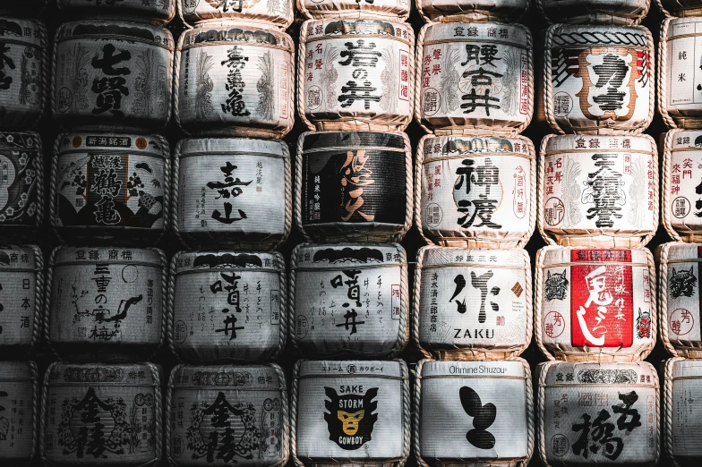 a closeup s of a wall of asian bottles