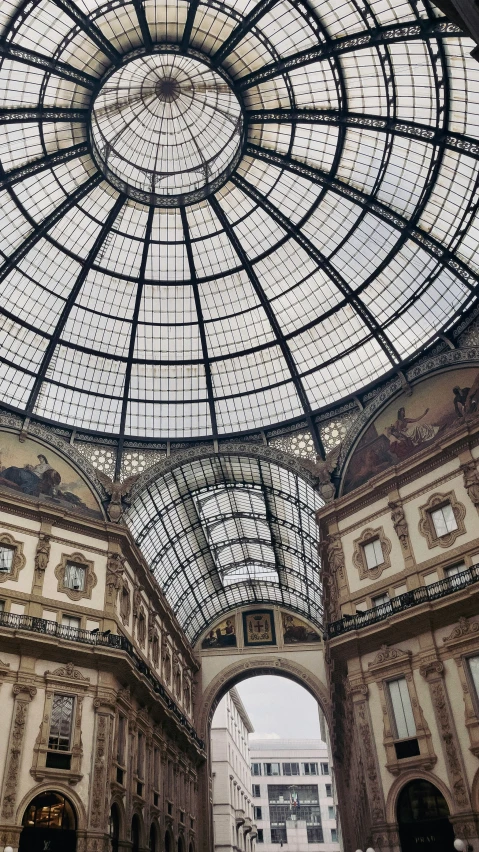 the interior of a large building with a glass roof