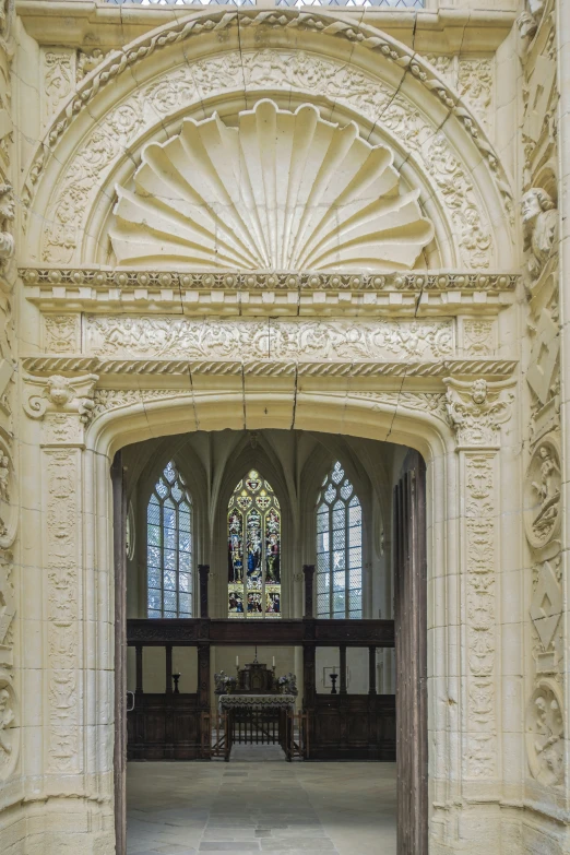 an ornate building is built around a table