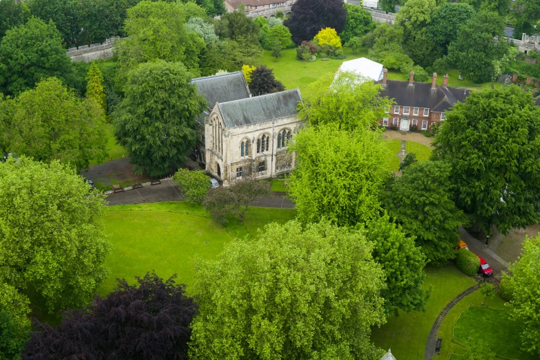 the house is in the middle of a large field