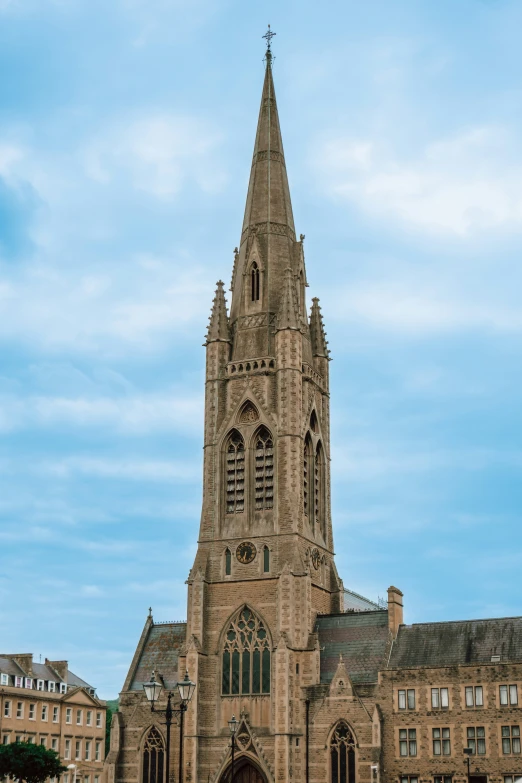 a tall clock tower sitting next to a building