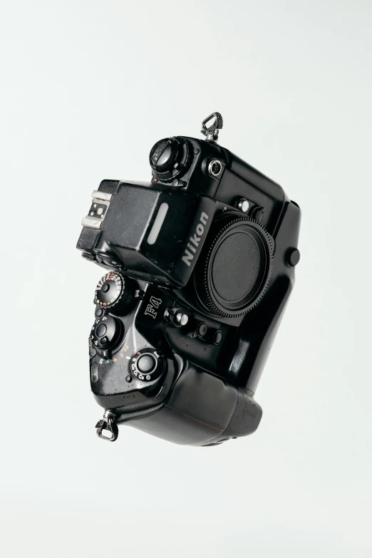 a pair of cameras with different lens body parts attached