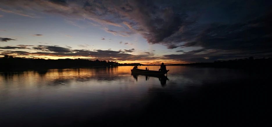 a boat that is floating on a body of water