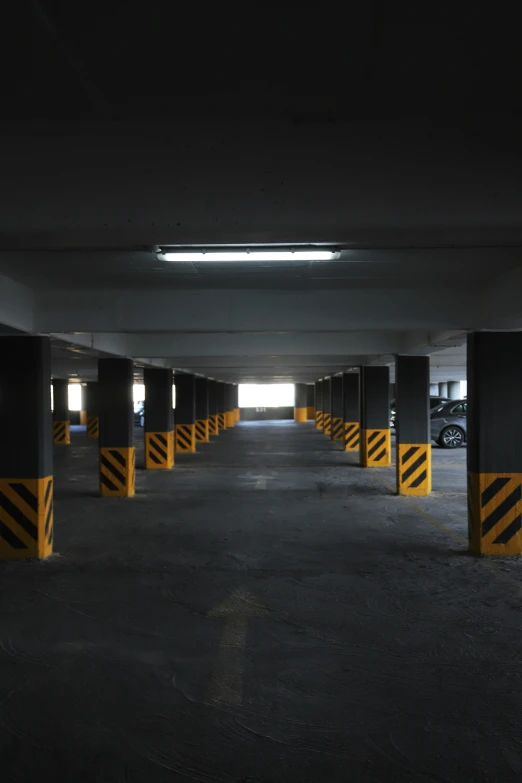 an empty parking lot with some signs on it