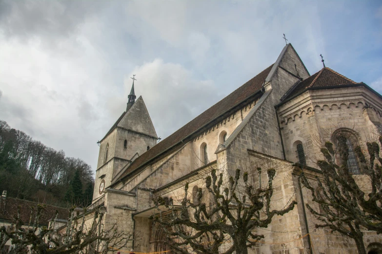 an old church with a clock on the tower