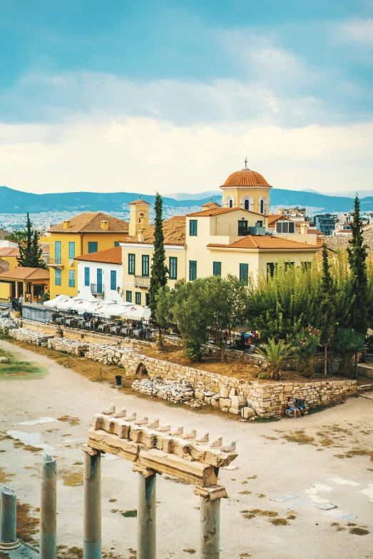 a town with roman columns is pographed from above