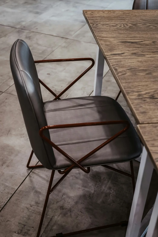 the modern dining table has two chairs set up