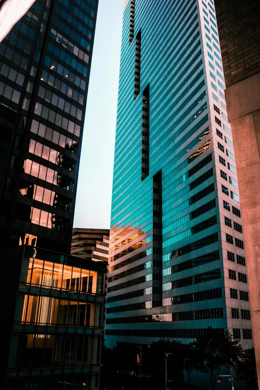 some very tall buildings in the middle of a city