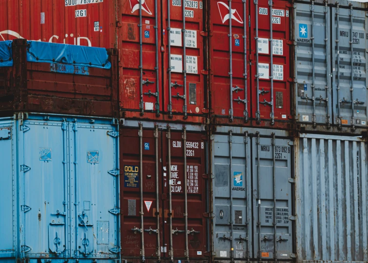 stacks of boxes sitting next to each other near one another